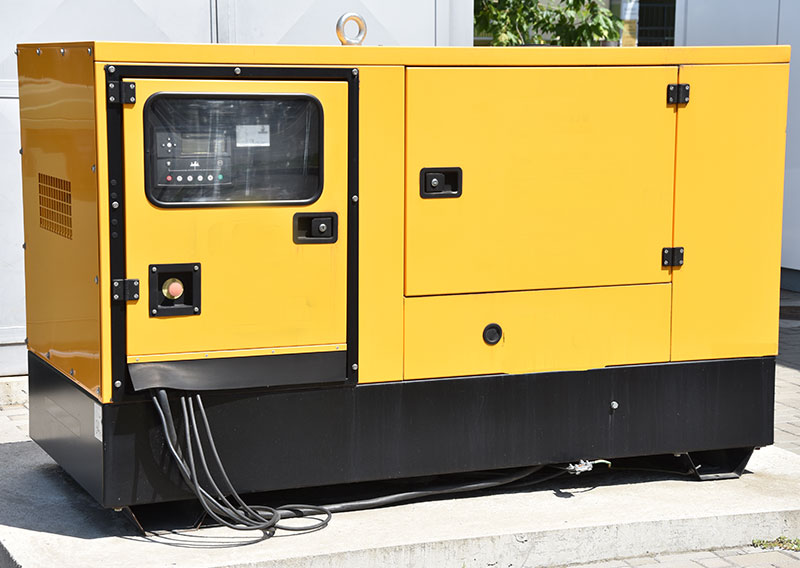 An industrial backup diesel generator set requiring generator-safe passive harmonic filtering