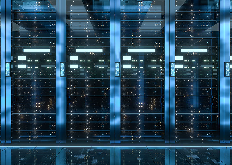 Modern server racks inside a data center facility, utilizing a 3P4W SVG system to balancing phases and eliminate neutral overcurrent.