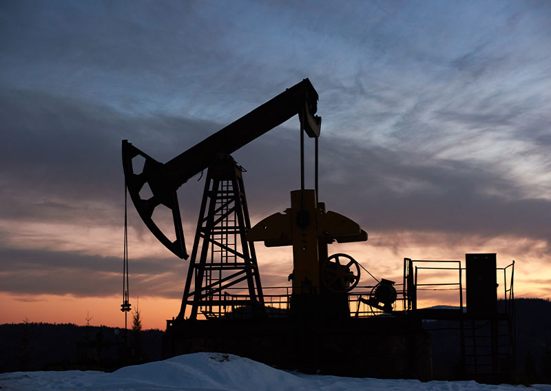 Heavy-duty sine wave filter application for VFD motor protection in an oilfield pumpjack installation environment.