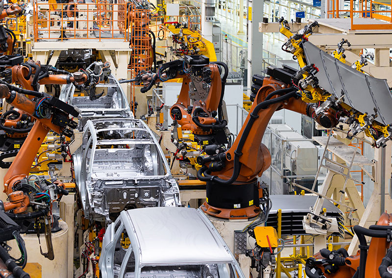 Automotive heavy manufacturing welding production line with robotic arms, using dynamic SVG systems to solve VFD and welder voltage drops.