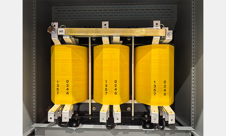 Dry-phase transformer high-voltage winding with H1 terminal in a metal enclosure manufactured by LTECPower