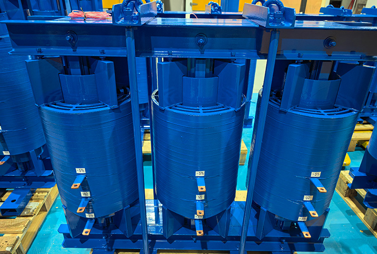 Three-phase iron-core detuned reactor for power factor correction capacitor banks.